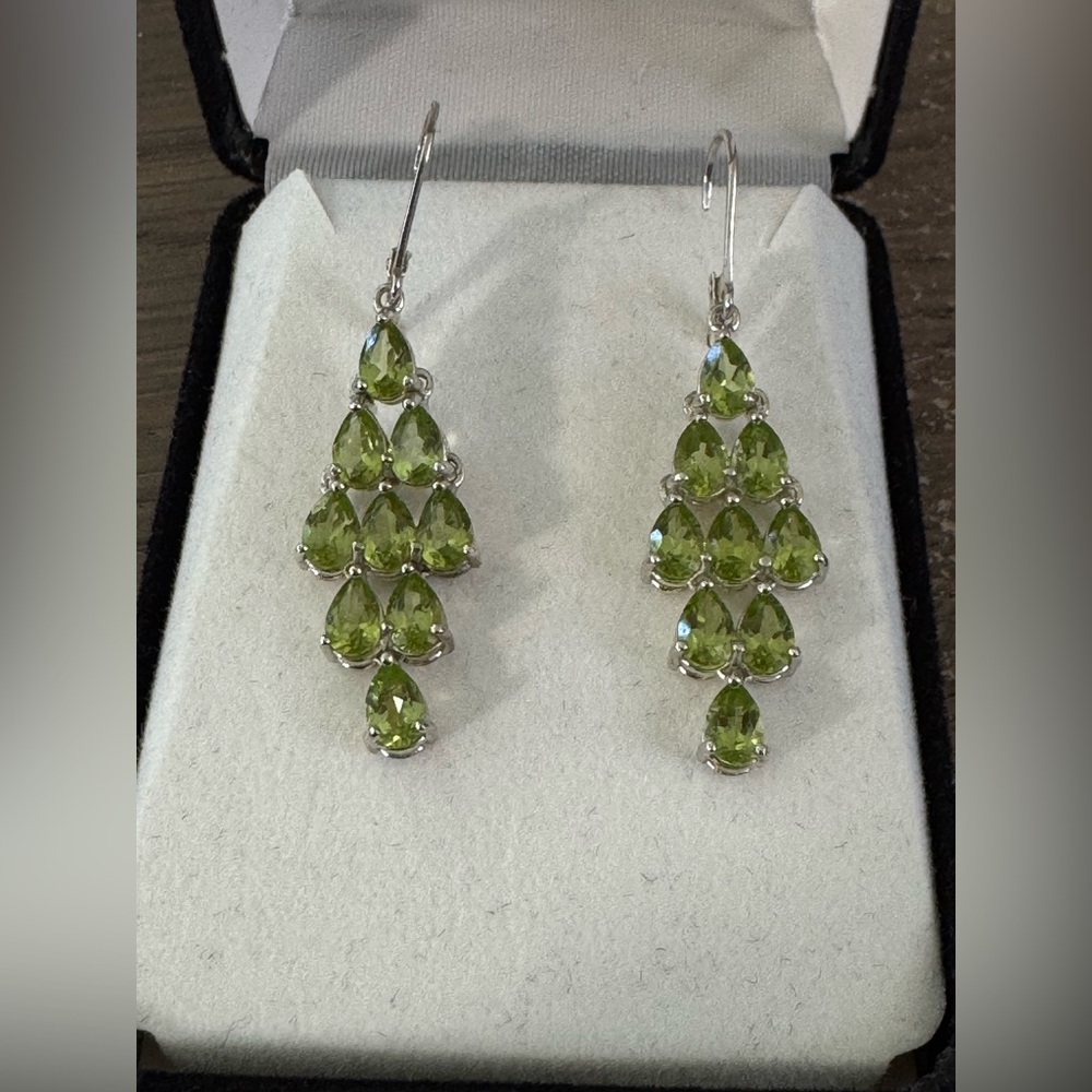 Peridot and Sterling silver hanging earrings. Wire clasp, 1 1/2 inch long.